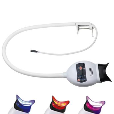 Un bon prix. Machine de blanchiment des dents montée sur une chaise dentaire Lumière blanchissante froide lumineuse violette lumineuse en ligne