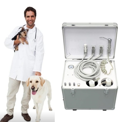 Vétérinaire utilise une unité dentaire portable de bagages de style animaux de compagnie machine de traitement dentaire avec compresseur d'air
